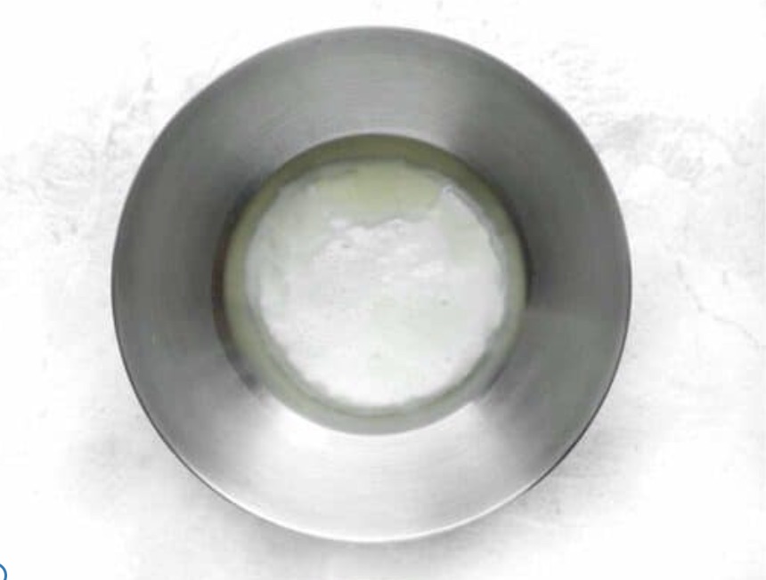 making pancakes in a bowl. 